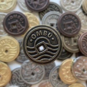 Token metal – 1 Ombú – ouro seco 24Acanac
